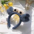Blue fuzzy fleece headband with heart balls shown on white linen with tulips - Hair Hoop-Blue Crab