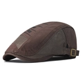 Detail of dark brown flat cap showing breathable mesh panels and metal adjustment buckle - Adjustable / Brown