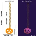 Halloween necklace featuring felt evil pumpkin pendant and golden bead chain with glow effect - Evil Pumpkin Style
