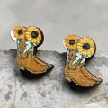 Detailed close-up of wooden cowboy boot earrings with sunflower print on a stone surface - 8-Sunflower Cowboy Boot