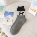 Cute knitted mid-calf socks with black dog pattern and colorful flecks in grey and white - 25138 Light Grey Dog