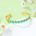 Daisy titanium steel bracelet with blue enamel flowers and a golden base finish - Dark Blue Flower Bangle