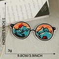 Sunglasses shaped embroidery patch with sunset mountain scene and adhesive backing - Sunglasses Landscape