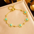 Bracelet à fleurs en acier doré avec pierres de turquoise bleue pour femmes - Bracelet à Cinq Fleurs (B1439)