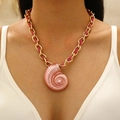 Pink conch shell pendant necklace with golden chain and woven pink rope on a model - Pink Braided Chain Pink Shell Necklace (1099)