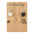Detail view of friendship necklace set with sun, moon, and heart charms on card - Silver (New Friendship Card Set)