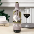 Knitted Christmas gnome wine bottle cover in green and purple with soft plush pom-poms - Grey and Green Rudolf Style