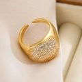 Macro shot of gold-plated open ring featuring multi-row pave-set white cubic zirconia - 14490-Domed Pave Style
