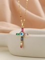 Detailed close-up of a golden cross necklace featuring colorful pavé gems and evil eye - Gold Multi-color Zirconia (Evil Eye)