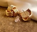 Elegant gold twisted knot stud earrings with metallic woven texture and secure clear backs - Threaded Nine Tube 19# Gold Style