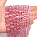 Pink cat eye stone round beads for DIY jewelry making shown in various sizes - 10mm/35pcs / Pink