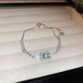 Silver bolo bracelet with rectangular blue gemstone surrounded by sparkling crystals - Silver Blue Square Zirconia (5076371384513)