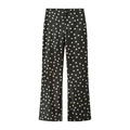Detail of high-waisted satin flare trousers featuring a classic black and white polka dot pattern - XS / Black Polka Dot Pants