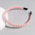 Detail of pink crystal beaded headband with comfortable black non-slip ends and fabric wrap - Pink