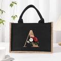 Black canvas tote bag with beige trim and golden letter A with floral design - Bronze Floral Letter A