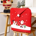 Detail of red Christmas chair cover with Santa Claus prints and white pom-pom décor - Christmas New Printed Chair Cover
