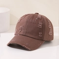 Close-up of distressed vintage brown cotton baseball cap with ripped brim detail - 52cm (Recommended 3-8 Years) / Coffee