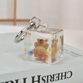 Creative Capybara liquid quicksand keychain in a clear square cube with brown bear charm - Noctilucent Capybara-Lying Back