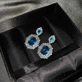 Blue oval sapphire earrings in silver setting with diamonds in a black gift box - Luxury Aquamarine Diamond Stud Earrings Tz-32