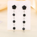 Elegant long tassel drop earrings with black star charms made of stainless steel - Steel Style (KE116365-KFC)