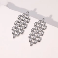 Minimalist silver geometric earrings with woven mesh texture on white background - Steel