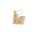 Macro detail of PVD 18K gold-plated letter M pendant with sparkling cubic zirconia inlay - Letter M Pendant