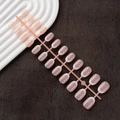 Macro shot of 24pcs nude and light brown French press-on nails with white tips - French White Tip Oval Glossy (DMC-01LY)