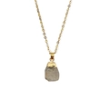 Macro detail of natural grey crystal pendant with gold-plated edges and fine link chain - Approx. 11*18mm / Smoky Quartz