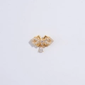 Detalle de colgante de lazo dorado con pavé de circonitas y cristal de gota clara - Colgante De Lazo Dorado