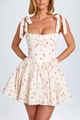 Close-up of square neckline with adjustable bow tie straps and pink floral pattern - S / White Floral