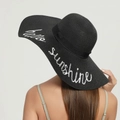 Black wide brim straw sun hat with white hello sunshine embroidery and black ribbon - One Size / Black