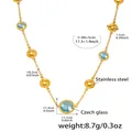 Golden stainless steel necklace with blue Czech glass pendant and spherical accents - 44+5cm / Gold Blue