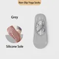 Gray low-cut yoga socks with cross elastic straps and white anti-slip silicone dots - Premium Grey