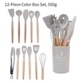 Set di 12 utensili da cucina in silicone tortora con manici in legno e secchiello - Cachi Set da 12 Pezzi