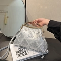 Borsa da sera con paillettes argento con frange e manico in metallo dorato lucido - Argento