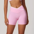 Pink high-waisted yoga shorts with crossover V-waist and white contrast piping - S / Sakura Pink