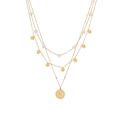 Layered gold necklace with pearls, small disks and a coin pendant on white background - Coin Style (2# Coin)