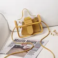 Yellow transparent jelly handbag with interior pouch and adjustable shoulder strap - Yellow