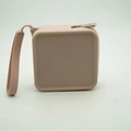 Square pink silicone coin purse with top zipper and wrist strap for earphones - Lotus root pink