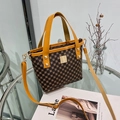 Sac seau rétro monogramme marron foncé avec poignées et bandoulière en cuir orange - Marron