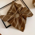 Brown striped fabric scrunchie with a gold heart pendant on a minimal tray - Coffee Square Striped