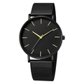 Macro detail of the black mesh steel strap and golden hands on a minimalist watch dial - Black Gold Hands