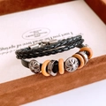 Vintage multilayer black leather bracelet featuring wooden rings and silver sun motifs - Black Leather Multi-Layer Ethnic Bracelet (67#)