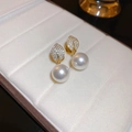 Elegant gold leaf earrings featuring small diamonds and a dangling white pearl - No 16 Gold Plated Gold