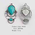 Vintage ethnic alloy pendant with turquoise stones in retro silver finish and droplet shape - Vintage Teardrop