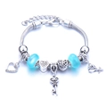 Silver snake chain bracelet with blue glass beads, heart and rose charms, lobster clasp - Light Blue