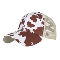 Women's trucker hat with brown cow print and breathable mesh panels, side view - Adjustable / Coffee