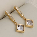 Elegant gold-plated square stud earrings featuring sparkling cubic zirconia tassels - Gold + Square