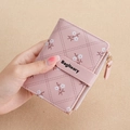 Pink PU leather short wallet featuring floral print, quilted pattern and snap strap closure - Pink