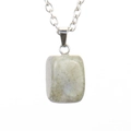 Macro detail of natural tiger eye stone pendant with a silver-colored O-chain necklace - Silver Moonstone